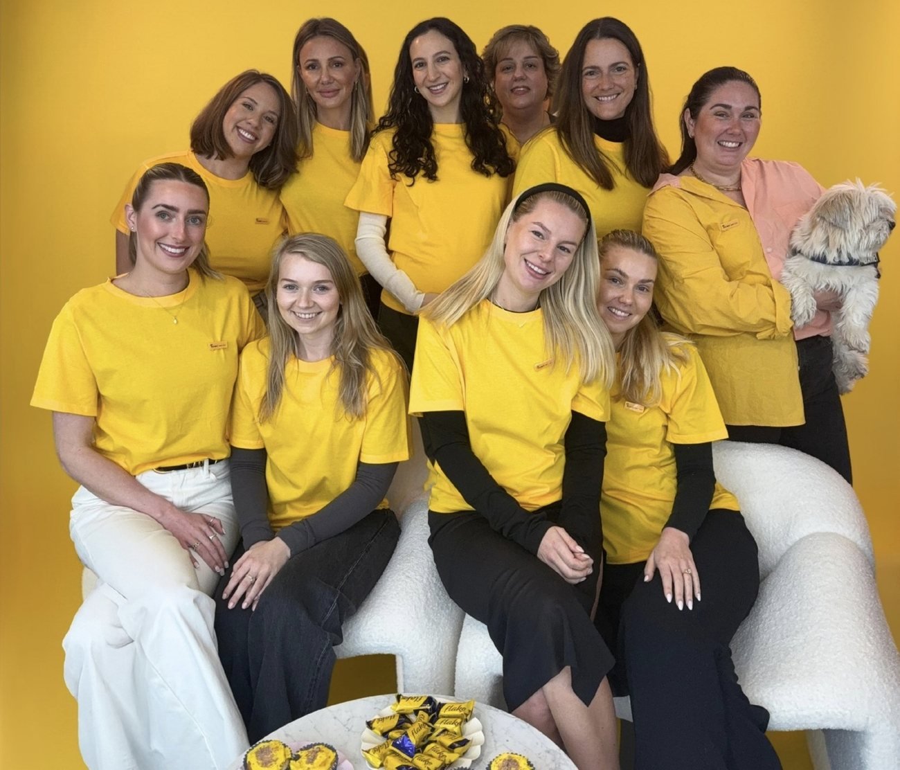 The Who In The Zoo team in the studio, wearing yellow for R U OK? Day